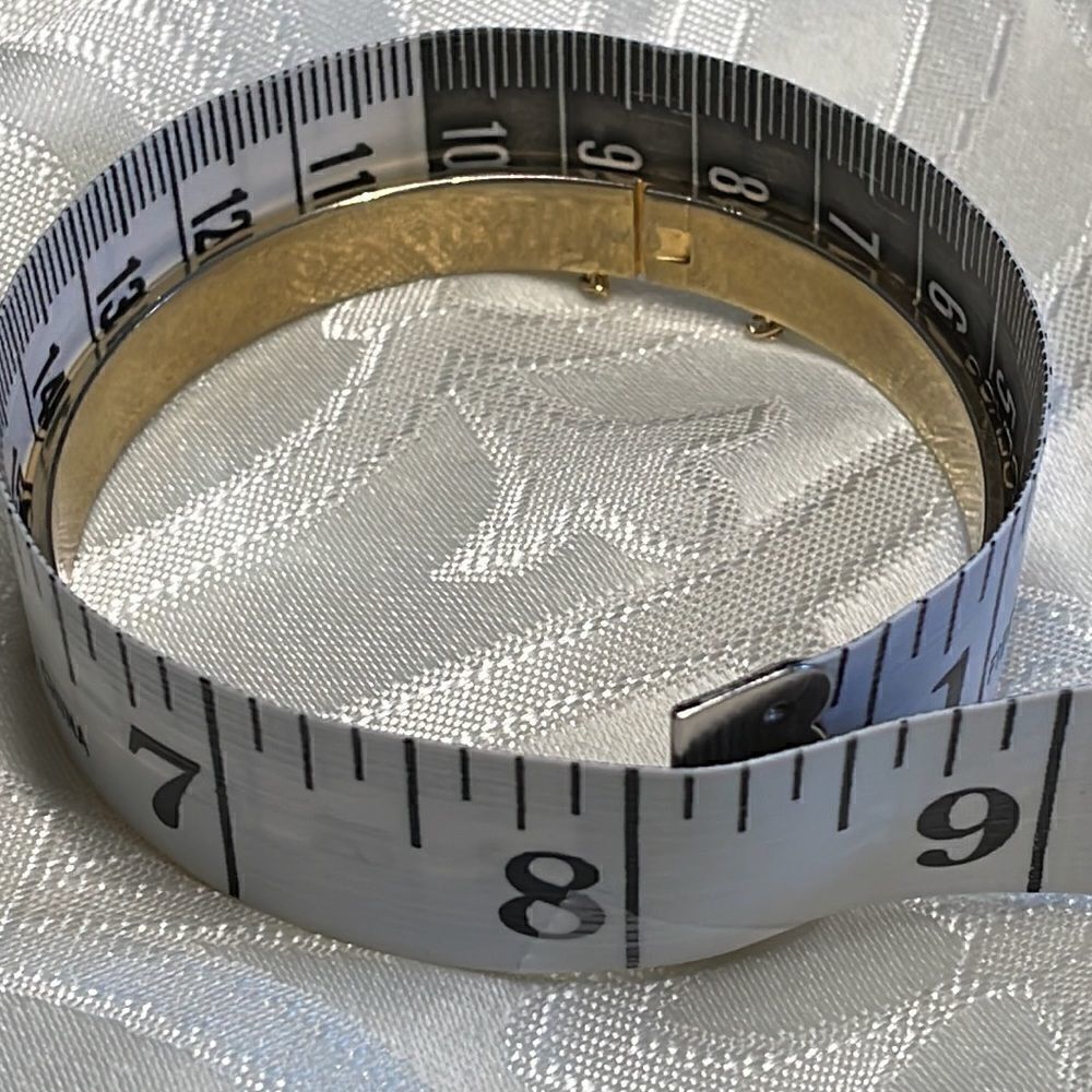 Two gold tone bracelets: one is vintage hinged & other is Monet faceted bangle - Picture 11 of 13